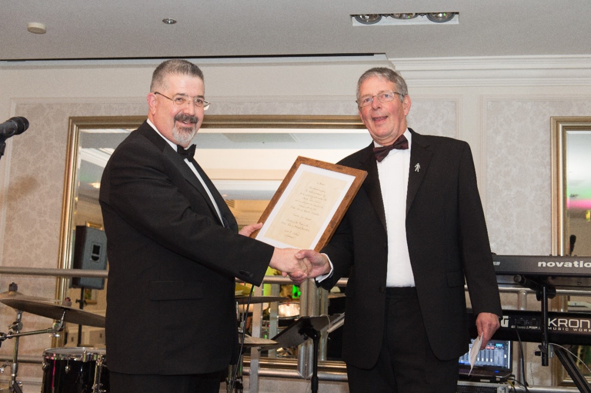 BVAA CEO Rob Bartlett presenting the award to Martin Greenhalgh